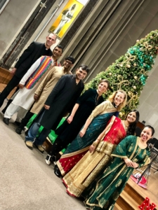 Group of church leaders at Holy Trinity Hounslow in front of Christmas Tree